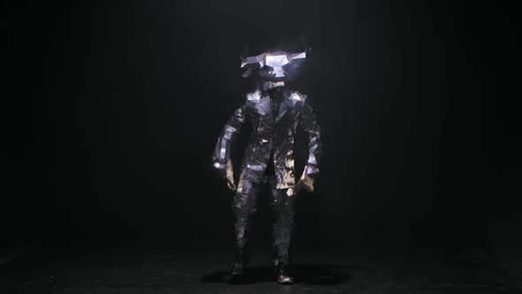 Showman in Reflecting Shiny Costume Made of Mirrors Dances and Scatters Dollars Merrily in a Dark alt