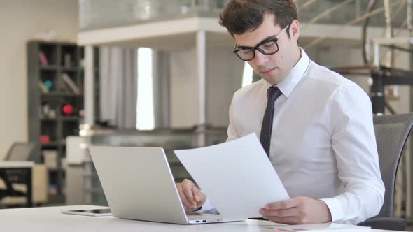 Businessman Working on Documents Paperwork alt