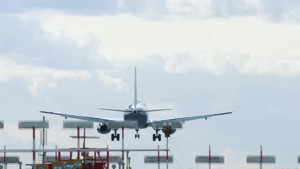 Airplane Landing on Runway alt