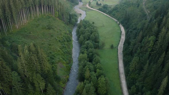 op view of the river and its parallel road in the Carpathians