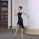Side View of Elegant Slim Ballerina Walking on Tiptoes with Columns Passing at Front - VideoHive Item for Sale