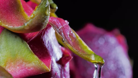 Wet Ripe Pitahaya Water Drip Over the Surface of Dragonfruit alt