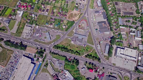 Crossroads and Many Vehicles Driving the Road alt