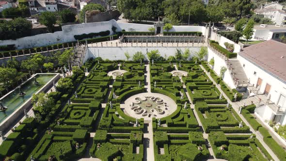 Aerial flyback over garden of Episcopal Palace of Castelo Branco, Portugal alt