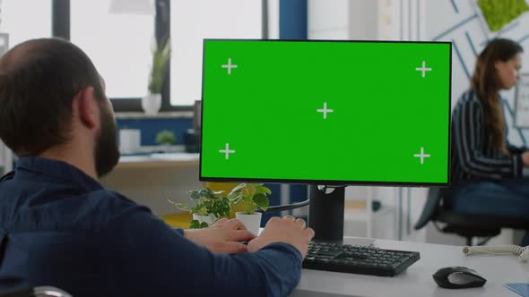 Paralized Invalid Businessman Sitting on Couch Using Pc with Green Screen alt