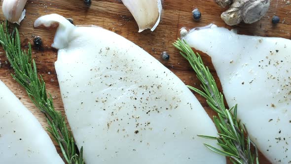 Fresh Boneless Skinless Cod Filet on Chopping Board