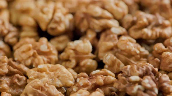 Looped Spinning Walnuts Without the Shell Closeup Full Frame Background alt
