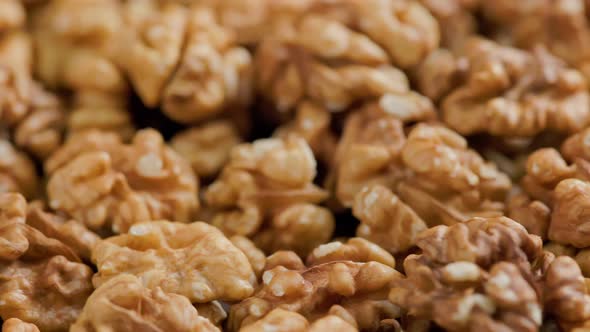 Looped Spinning Walnuts Without the Shell Closeup Full Frame Background