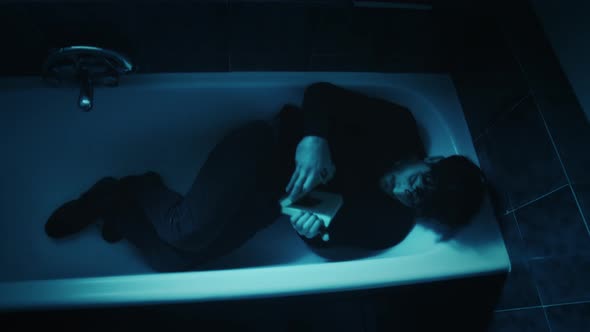 Guy in the Bathtub with Sad Atmosphere alt