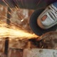 Man Works With Circular Saw Cuts Rebar Metal Tube - VideoHive Item for Sale