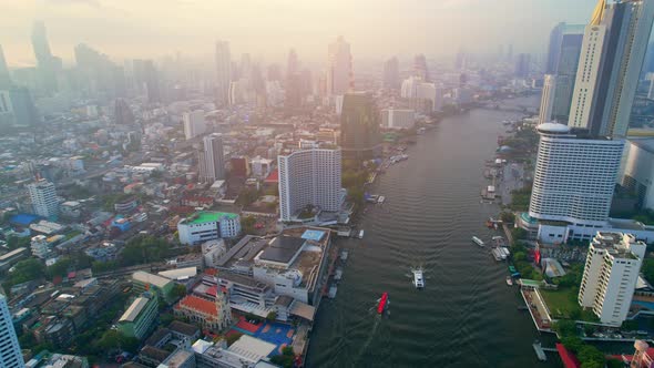 4K : Aerial city view of Bangkok downtown, Flying over Bangkok, Thailand. alt