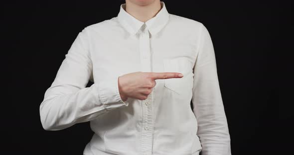 Woman's hand pointing direction to the right alt
