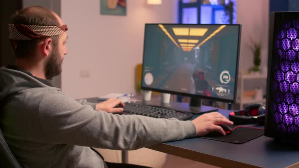 Caucasian Man Playing Online Video Games for Virtual Championship alt