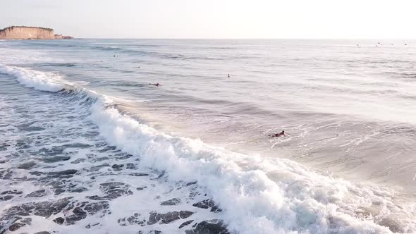Large Ocean Waves Splashing With Surfers Enjoying Summer Holiday In Olon Beach, Ecuador. - Aerial Wi alt