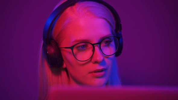 Woman Gamer in Neon Light