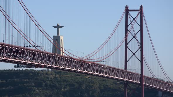The Large, Beautiful Statue Of Jesus Christ By The Abril Suspension Bridge In Portugal