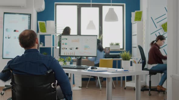 Handicapped Entrepreneur Coming in Start Up Office Colleagues Welcoming alt