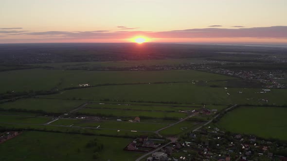 Sunset in fields. Drone Shots