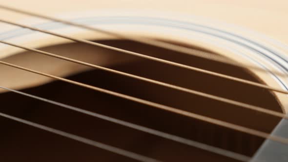 Close-up of  acoustic guitar plucked E string vibration 4K 2160p 30fps UltraHD footage - Details of  alt