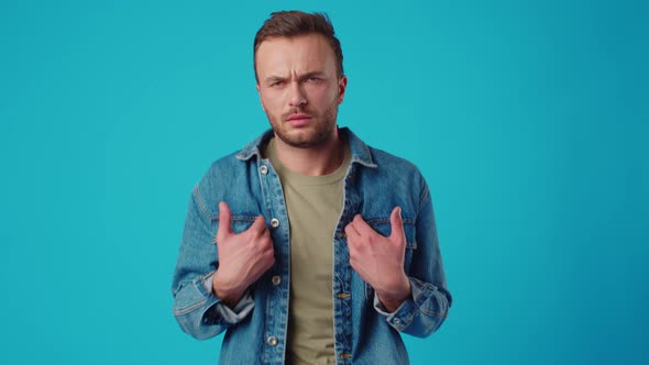 Young Caucasian Man Shows Gesture Its Not Me Against Blue Background