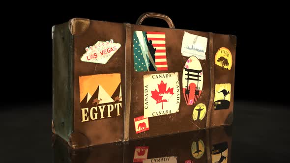The international airport. Travel suitcase with world's famous travel labels. alt