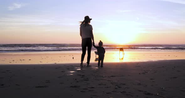 Holding Hands At Sunset