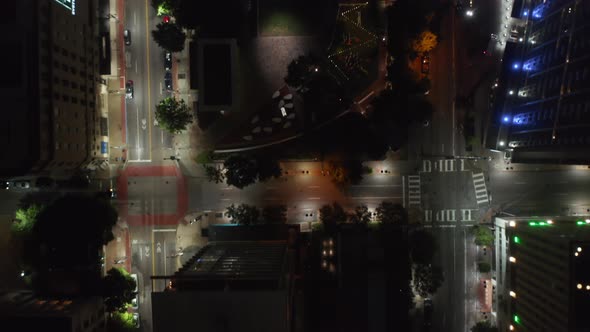 Aerial Birds Eye Overhead Top Down View of Low Traffic in Night Streets alt