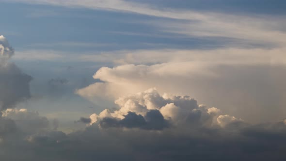 Time Lapse Footage of Fast Moving Dark Clouds Forming on Stormy Sky Before Thunderstorm alt