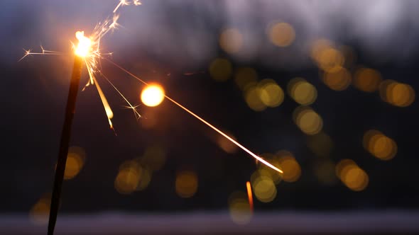Sparkler Firework Burning on Window New Year or Christmas Bengal Lights Glowing
