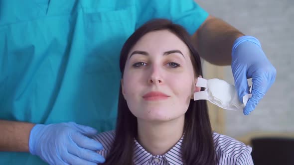 Joyful Face of a Young Attractive Woman After Plastic Surgery alt