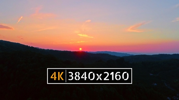 Sunsets Behind the Mountains alt