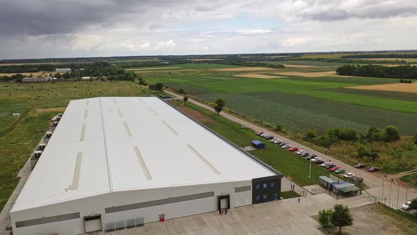 White Commercial Building Among Nature alt