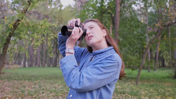 A Professional Photographer While Working Outdoors