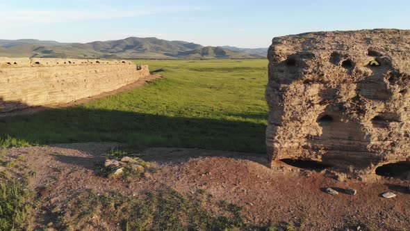 Ruins of Ancient City, Building and Wall From Ancient Times in Treeless Vast Plain of Mongolia alt