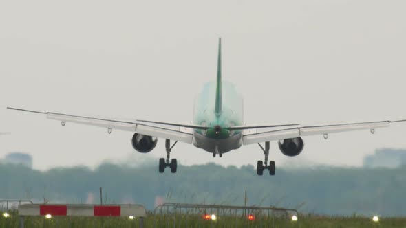 A passenger aircraft lands at Schiphol Airport