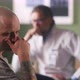 Bald Man Reacting To Band News and Talking with Oncologist