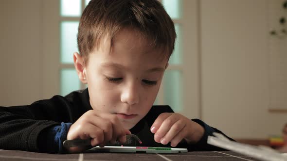 Child Plays with Perler Beads