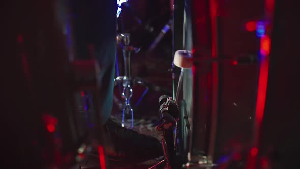 The Drummer Kicks the Bass Drum with a Pedal alt