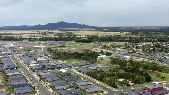 AERIAL ARC Over Town Of Lara, Australia With You Yang Mountain Ranges alt