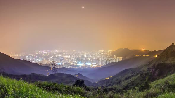 Cityscape of Hong Kong As Viewed Atop Kowloon Peak Night Timelapse with Hong Kong and Kowloon Below alt