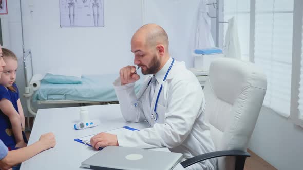 Sitting at the Desk and Writing the Treatment alt