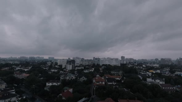 Timelapse with White Clouds Flying Fast Over the City on a Sunny Bright Summer Day