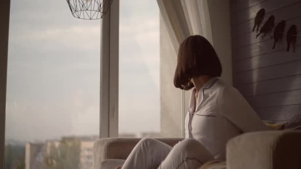 Brunette Enjoy Drink in House Alone alt