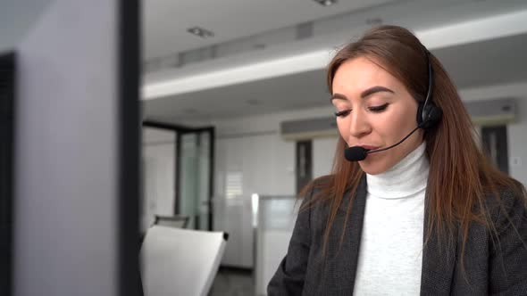 Female Customer Support Operator with Headset and Smile