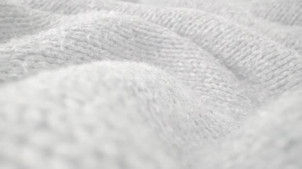 Extreme Detail View of Sheep Wool Cloth Texture Flowing in Macro Dolly Shot alt
