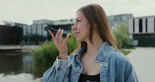 Woman Holding Phone Speak Activate Virtual Digital Voice Assistant on Smartphone alt