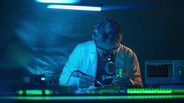 Technician Engineer Developer is Soldering Iron Pcb Microcircuit Electronic Component Though