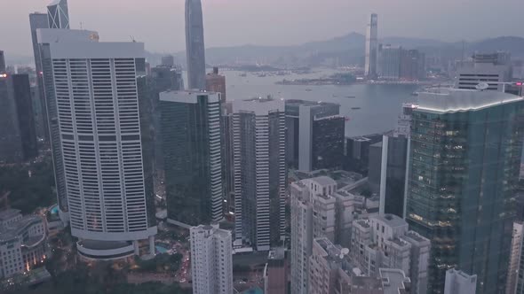 Hong Kong Island downtown city centre skyline at night. Aerial drone view alt