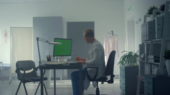 Physician Working Chroma Key Computer in Clinic alt