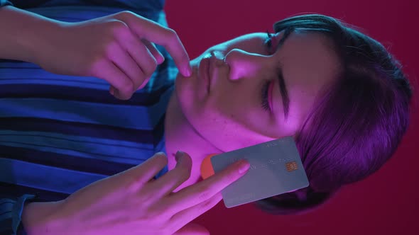 Debt Problem Bank Fraud Woman Card Neon Light alt